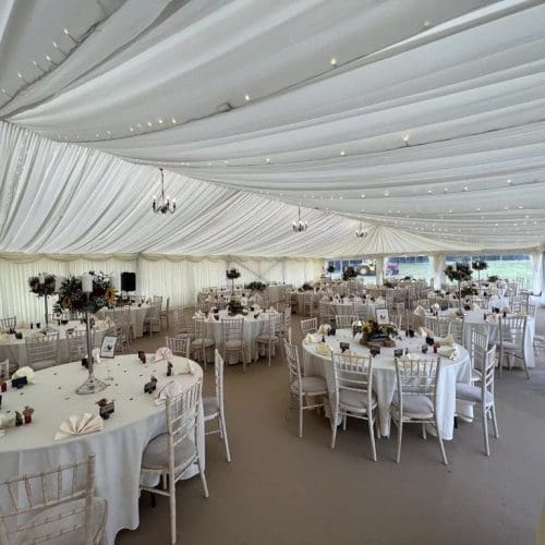 white tables and chairs